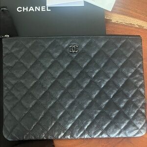 CHANEL Medium O Case Black Quilted Leather Zip Pouch with CC Emblem